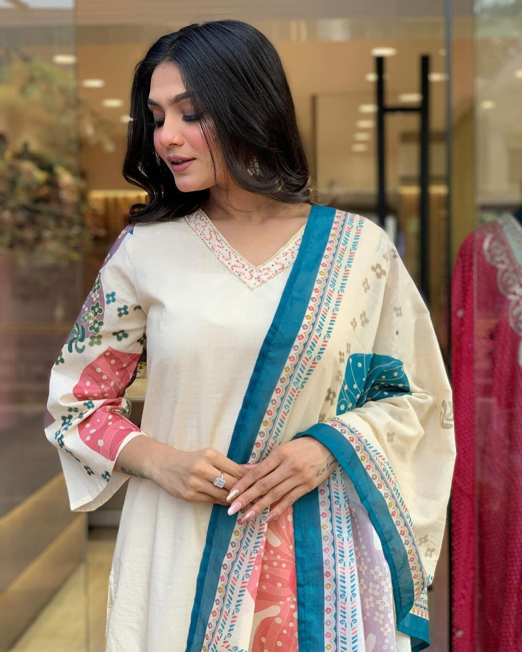 Launching Summer Cool, Comfortable And Attractive Softest Muslin Suit Set Which Is Beautifully Decorated With Hand Embroidery And Thread Work. It Is Paired With Matching Pants And Dupatta(PFAB118)