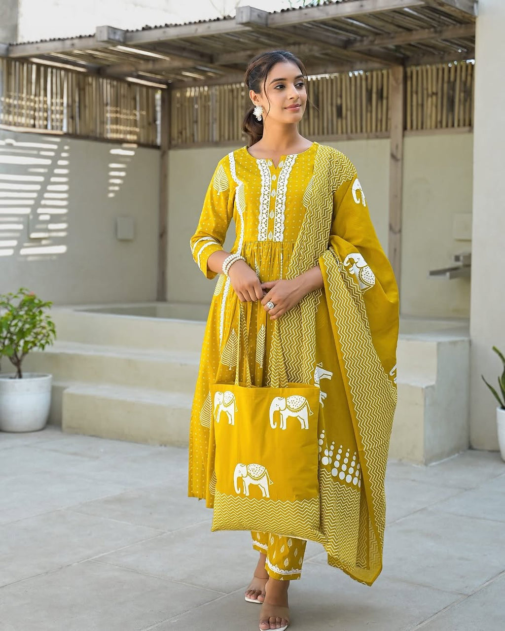 Jaipur cotton candy suits Look Nyra cut out of a dreamy movie set as you turn around and walk in this elegant flaired suit ! The perfect of traditional wear