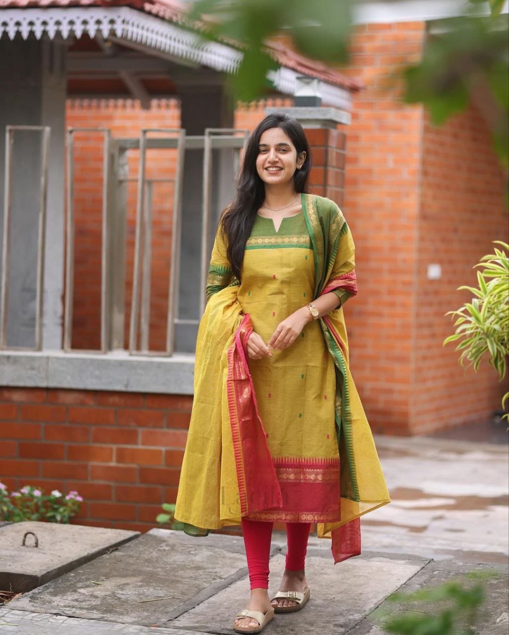 Crafted from pure Kanchi cotton, this elegant yellow ensemble is designed with love and rooted in South Indian cultural artistry. (RRRD11)