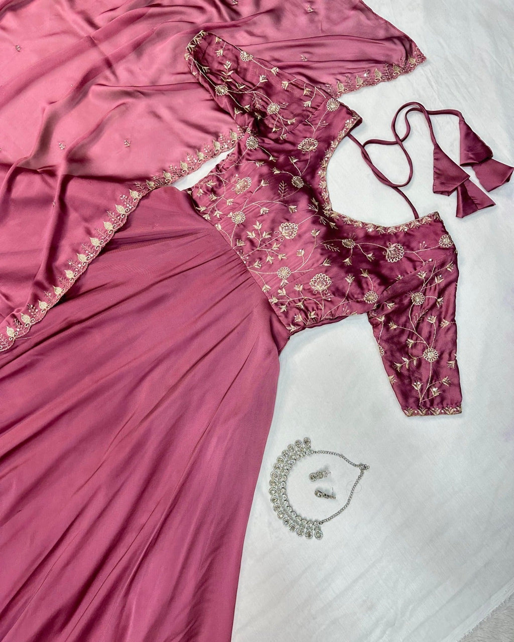 Featuring beautiful Heavy Gown with duppata Set which is beautifully decorated Embroidered🪡and Hand work. (RRRD03)